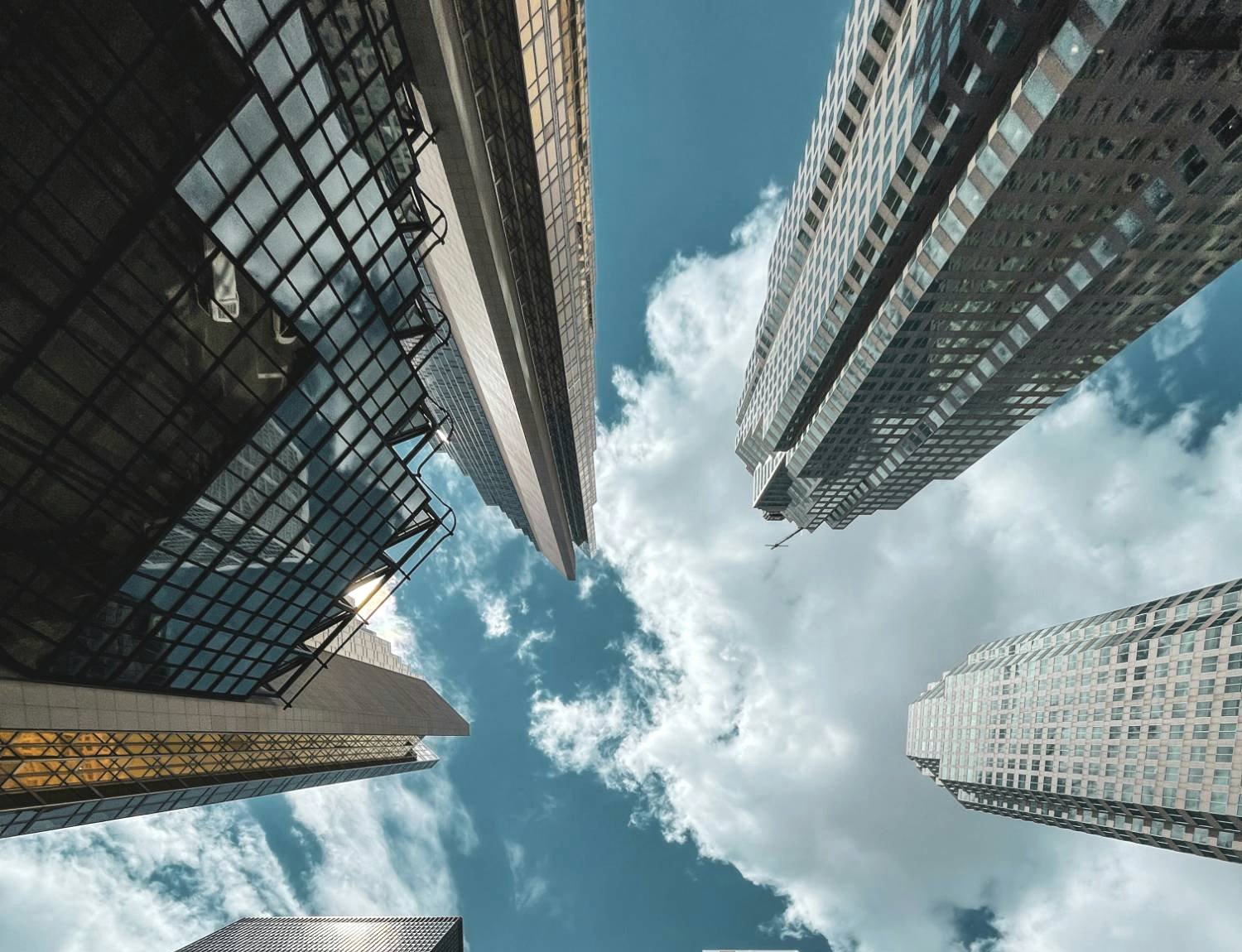 Office towers against a blue sky